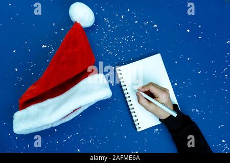 Man writes plans and goals. Stock Photo