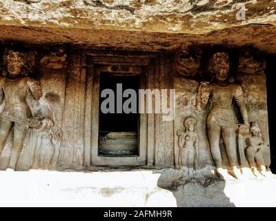 Ajanta caves with Buddha statue and beautiful architectural carvings on the pillars and walls in Aurangabad district, India. Stock Photo