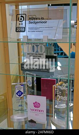 Sunday Times 100 Best Not For Profit Organisations,awards cabinet, Homes In Sedgemoor,Bridgwater,award winning social housing landlord Stock Photo