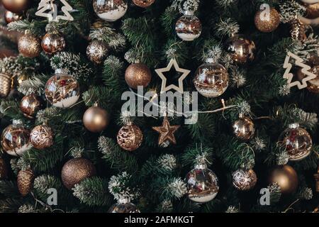 Christmas tree with decorations. Christmas balls, stars and garland. Stock Photo