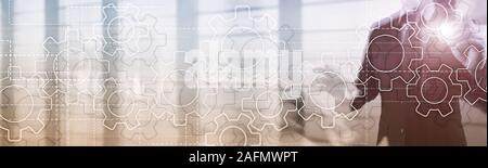 Gears mechanism on panoramic business background. Success Concept. Stock Photo