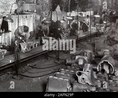 Workers are shown on the Allis Chalmers factory floor in Milwaukee, Wisconsin, ca. 1930. Stock Photo