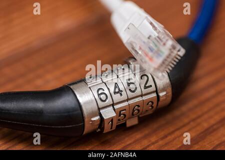 Computer internet cable and lock. Internet security concept. Digital cyber safety or security encryption concept. Stock Photo