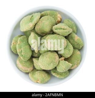 Portion of Wasabi Peanuts (as close-up shot) isolated on white background Stock Photo