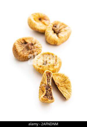 Sweet dried figs isolated on white background. Stock Photo