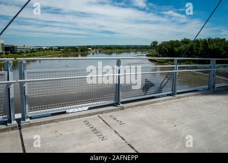 Nebraska/Iowa. Bob Kerrey Pedestrian bridge crossing the Missouri river from Nebraska to Iowa.  It is the first dedicated pedestrian bridge to connect Stock Photo