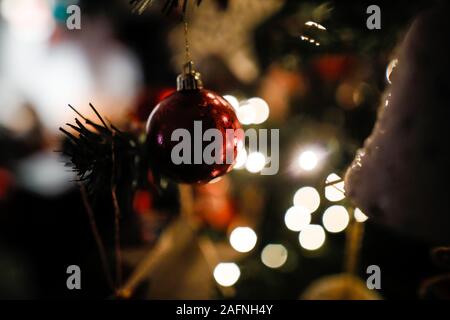 Shallow depth of field (selective focus) image with decorations on an artificial christmas tree Stock Photo