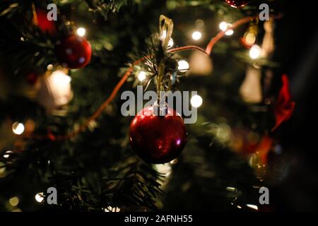 Shallow depth of field (selective focus) image with decorations on an artificial christmas tree Stock Photo