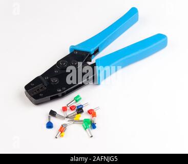 crimping tool and bootlace ferrules for electrical wires and cables Stock Photo