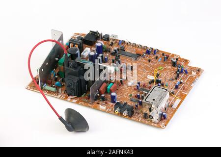 circuit board from old television set with EHT high voltage transformer Stock Photo