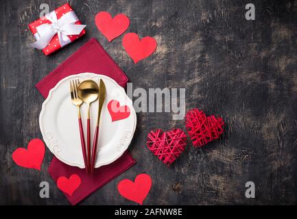 Valentines Day table setting with hearts Stock Photo