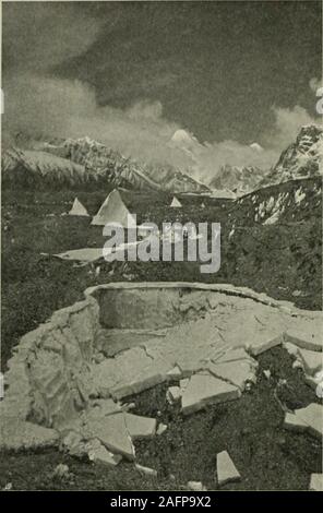 . Karakoram and western Himalaya 1909, an account of the expedition of H. R. H. Prince Luigi Amadeo of Savoy, duke of the Abruzzi. e merely supports of fallen tables. In anycase, we have no detailed descriptions which would suffice to identifythem with the pyramids of the Baltoro. These formations we observed only as far as the entrance to theConcordia basin. We saw iione of them on the higher portion of theglacier, where the action of melting is equally intense. But in theConcordia amphitheatre and on the upper Baltoro we saw formationswhich might account for the origin of the pyramids. I mea Stock Photo