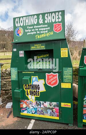 Recycling centre in car park with bank for clothing and shoes collected for the Salvation Army, Eyam, UK Stock Photo