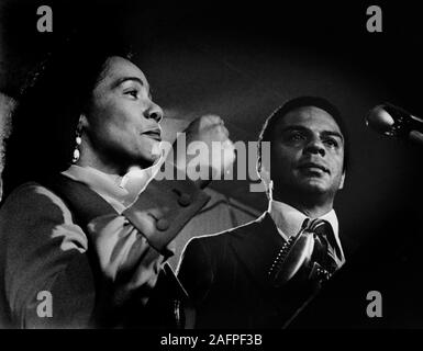 Coretta Scott King, widow of the slain civil rights leader Dr. Martin Luther King, Jr., stands with Andrew Young as he sheds a tear as he concedes defeat in his first run for the Georgia 5th District Congressional race on election night 1970. Young's longtime friend and lieutenant to Martin Luther King, Jr. - To license this image, click on the shopping cart below - Stock Photo