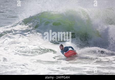 Belly board surfing, Praia de Faro (Mar), Algarve, Portugal Stock Photo