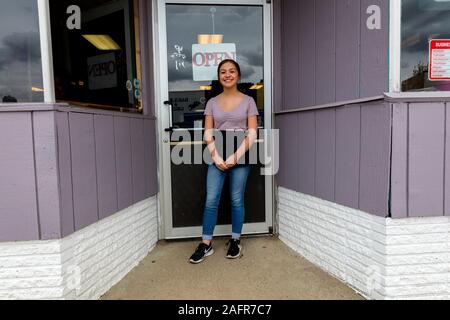 MAY 21, 2019 - Wolf Point, Montana, USA - Waitress Jacki at Wolf Point Cafe, Montana Stock Photo