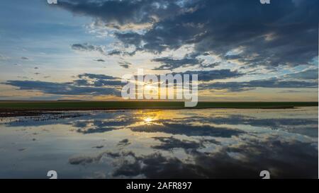 MAY 22, 2019, GREAT FALLS, MONTANA, USA - Sunset reflections on Missouri River and Petroleum Plant, Great Falls Stock Photo