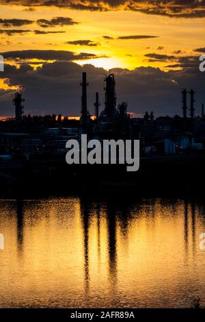 MAY 22, 2019, GREAT FALLS, MONTANA, USA - Sunset on Missouri River and Petroleum Plant, Great Falls, Montana Stock Photo