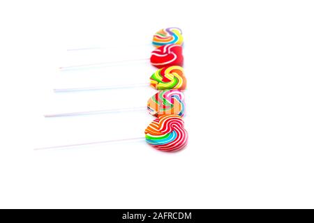 Sweets candies heart shape color full on white background, Set candy of color rainbow lollipops, Gift for Valentine day Love concept Stock Photo