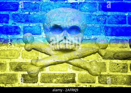 Flag of Ukraine painted on a brick wall with an image of a skull and crossbones, texture, background. Stock Photo