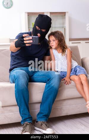 The child trafficking and abuse concept with small girl Stock Photo - Alamy