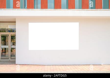 Mock up template. Big blank billboard outdoors, outdoor advertising board on the wall Stock Photo