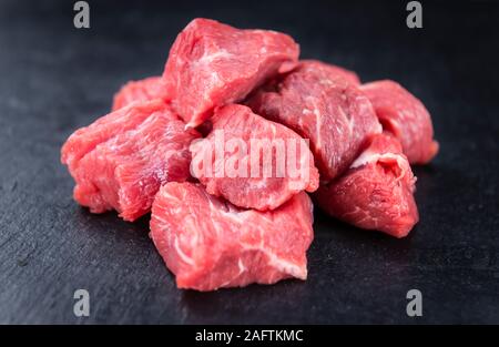 Chopped Beef Steak on a slate slab (selective focus; close-up shot) Stock Photo