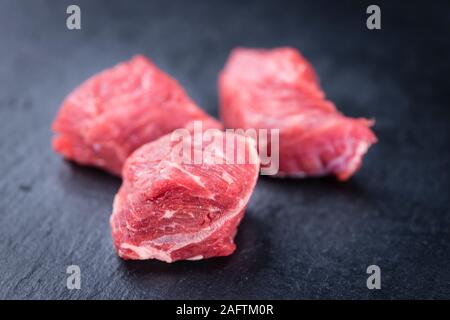 Chopped Beef Steak on a slate slab (selective focus; close-up shot) Stock Photo