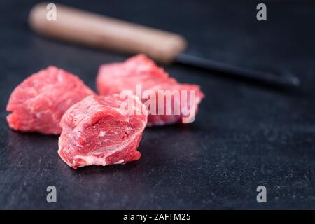 Slate Slab with chopped Beef (close-up shot; selective focus) Stock Photo