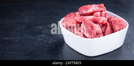 Slate Slab with chopped Beef (close-up shot; selective focus) Stock Photo