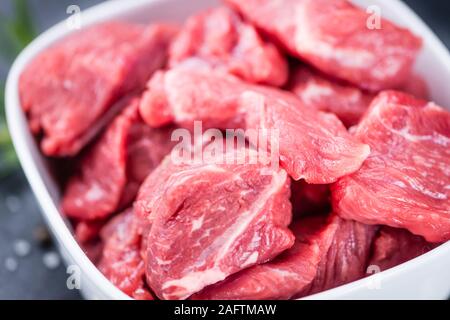 Slate Slab with chopped Beef (close-up shot; selective focus) Stock Photo