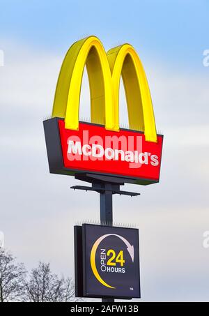 The yellow M sign outside a McDonald's restaurant in Northampton, England. Stock Photo