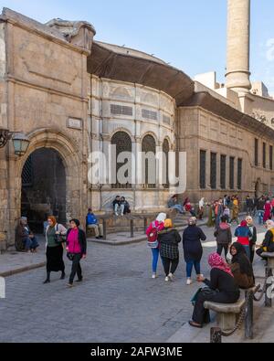 Cairo, Egypt- December 14 2019: Moez Street with facade of Ottoman era historic Soliman Agha El Silahdar complex building, Old Cairo Stock Photo