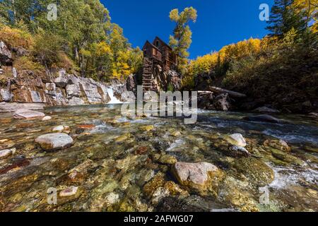 OCTOBER 2, 2019, CRYSTAL, COLORADO, USA - Old Mill is an 1892 wooden powerhouse located on an outcrop above the Crystal River Stock Photo