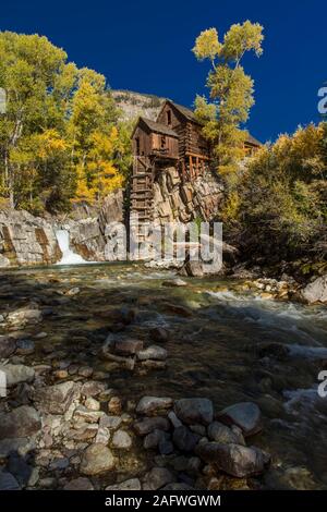 OCTOBER 2, 2019, CRYSTAL, COLORADO, USA - Old Mill is an 1892 wooden powerhouse located on an outcrop above the Crystal River Stock Photo