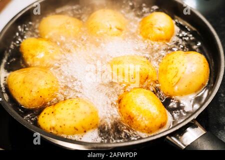Potatoes cooked in salty water, mediterranean style Stock Photo