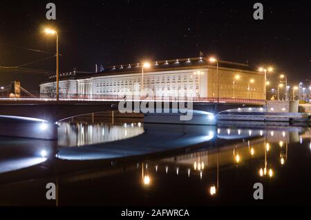 Wroclaw, Poland - 01.12.2019: Regional government office, Lower Silesian Regional Assembly building in Wroclaw at night time. Reflections View from th Stock Photo