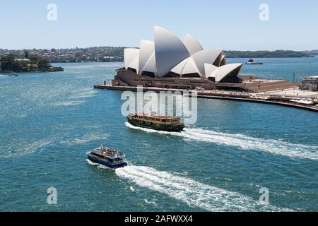 Sydney ferry passes Opera House, Australia Stock Photo