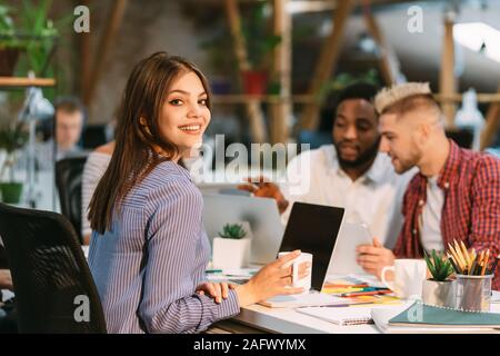 Office plankton. Young people working in office Stock Photo