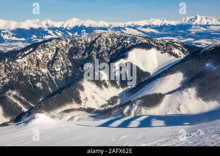 Slovakia. Low Tatras. Snowy winter peaks in sunny weather and valleys forest Stock Photo