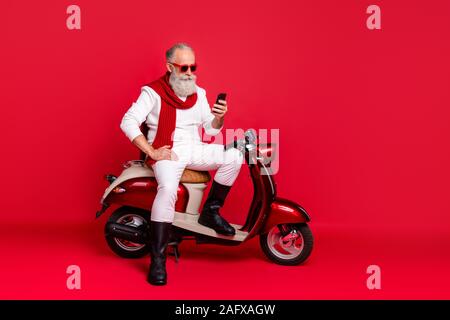 Full length body size view of his he nice attractive well-groomed stylish confident content focused gray-haired man using internet online browsing 5g Stock Photo