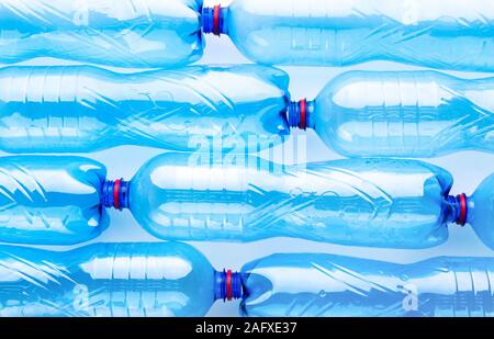 Creative composition of plastic bottles pattern on white Stock Photo