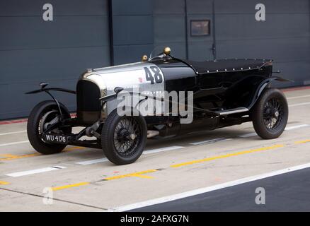 A  Black and Silver, 1922, Bentley 3/4½ Litre parked in the International Pits, during the 2019 Silverstone Classic Stock Photo