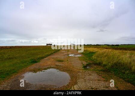 Wartime concrete road Shingle Street Suffolk England Stock Photo