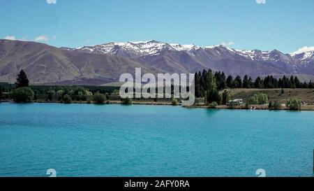 Glacier Lake View with background of snowy Mount Cook on a sunny day. Stock Photo