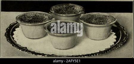 . American cookery. CUbTARD PUDDING 536 AMERICAN COOKERY. ( CUSTARDS BAKED IX GLASS CUPS on several folds of cloth in a bakingpan; pour in boiling water to half theheight of the cups; let bake, withoutthe water boiling, until firm in the center;grate a little nutmeg over the top of thecustard and let chill before serving.Serve in the baking cups. This custardmay be made with three eggs. Caraway Seed Jumbles Beat half a cup of butter to a cream;gradually beat in one cup of sugar, oneegg beaten light, one-fourth a cup ofmilk, three cups of flour with four levelteaspoonfuls of baking powder and t Stock Photo
