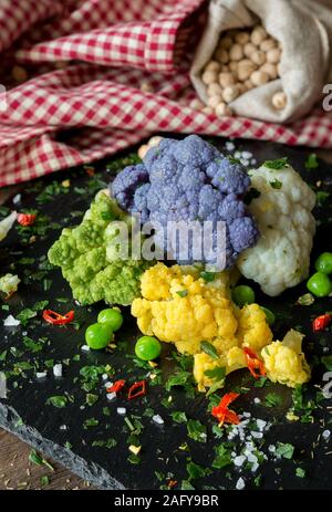 various type colored cabbage on autumnal background Stock Photo