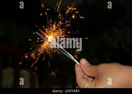 Small fireworks are lit at the new year's event Stock Photo