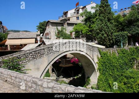 View of the Crooked Bridge (Kriva Cuprija) in historic Mostar, Bosnia and Herzegovina Stock Photo