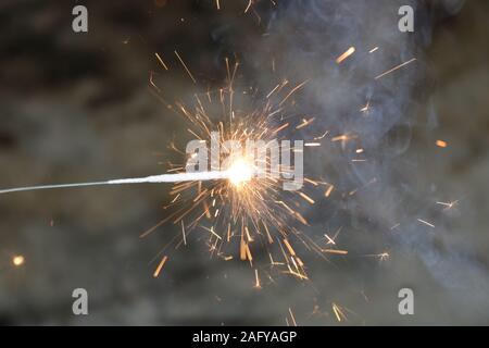 Small fireworks are lit at the new year's event Stock Photo